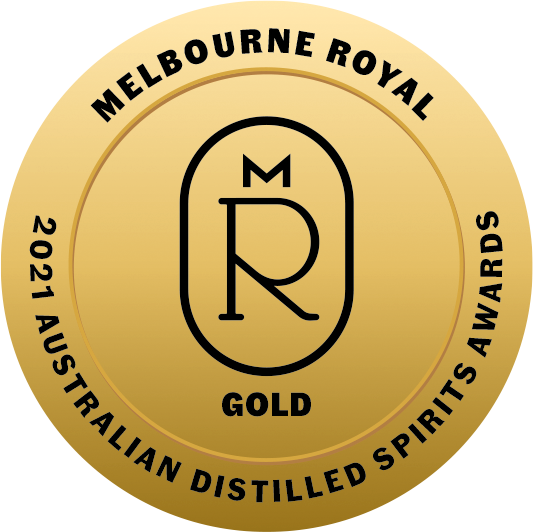 Gold medal badge for the 2021 Australian Distilled Spirits Awards from Melbourne Royal, featuring a central logo and black text on a gold background.